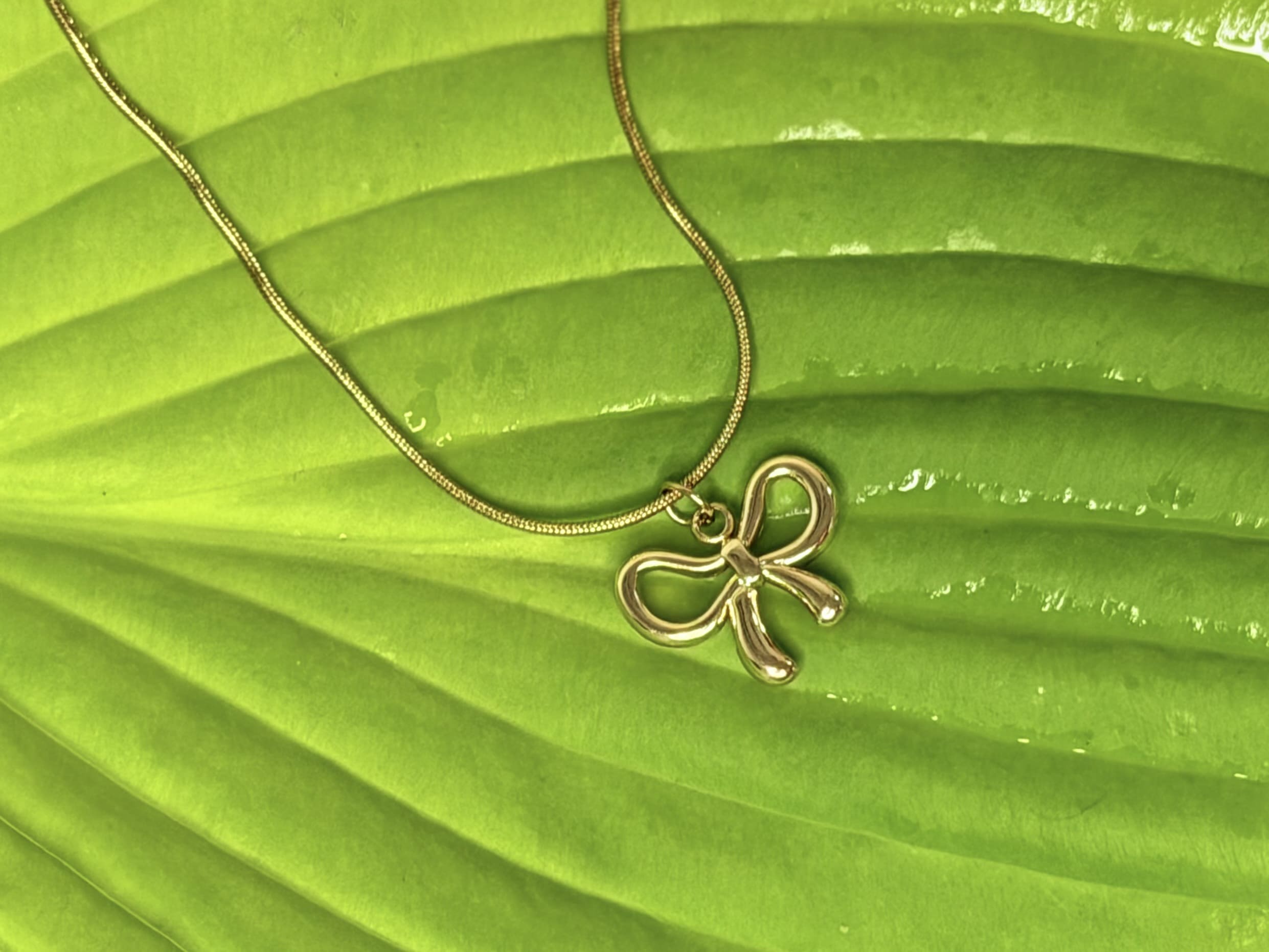 THE BELLA BOW NECKLACE