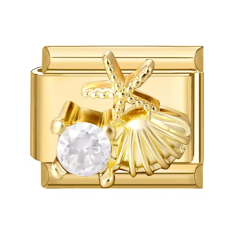 Charm coquillages dorés et strass