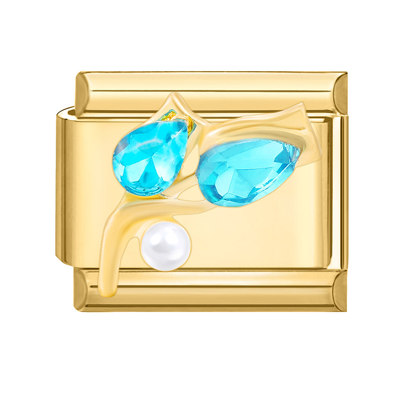 Charm doré avec pierres bleues et perle