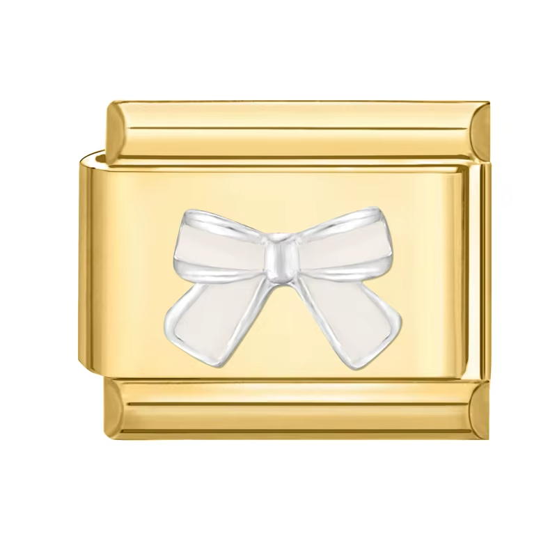 Charm en or avec nœud blanc