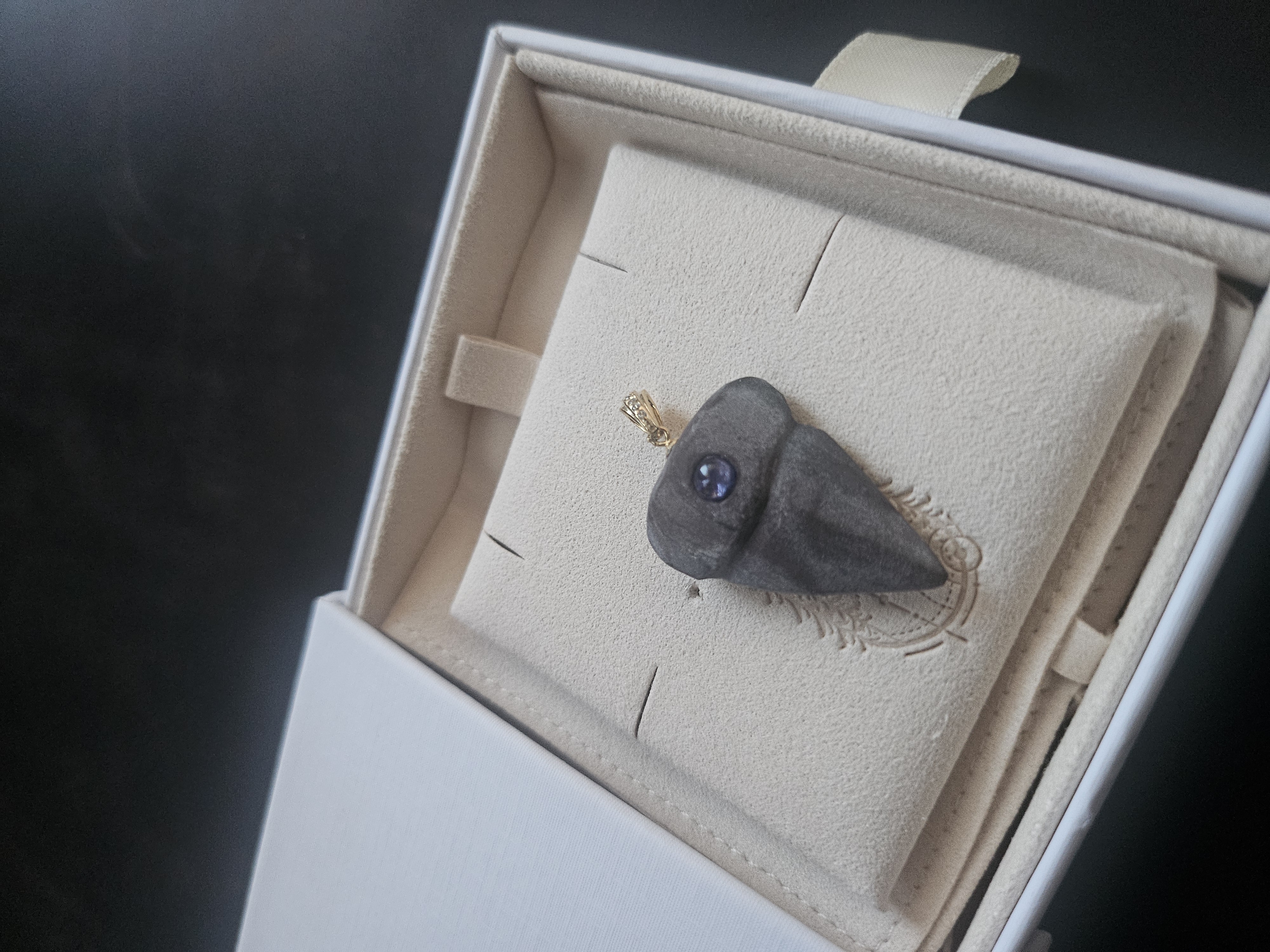 Carved Bonneville Stone Shark Tooth · Tanzanite Pendant