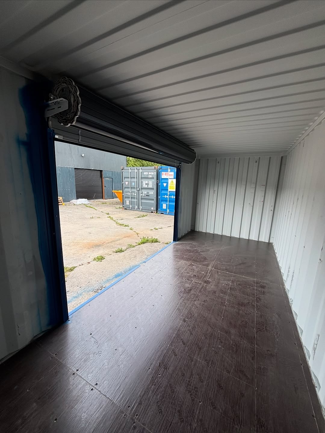 Blue Shipping Container with Roller Door