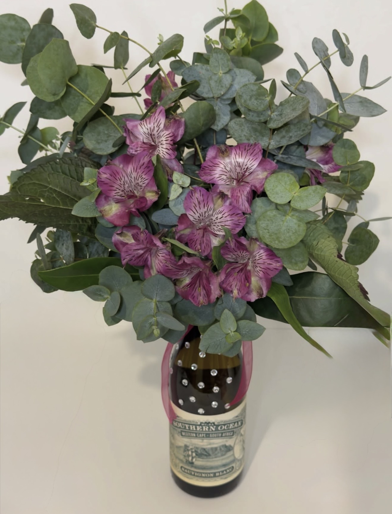 Ramo Floral en Botella Decorativa