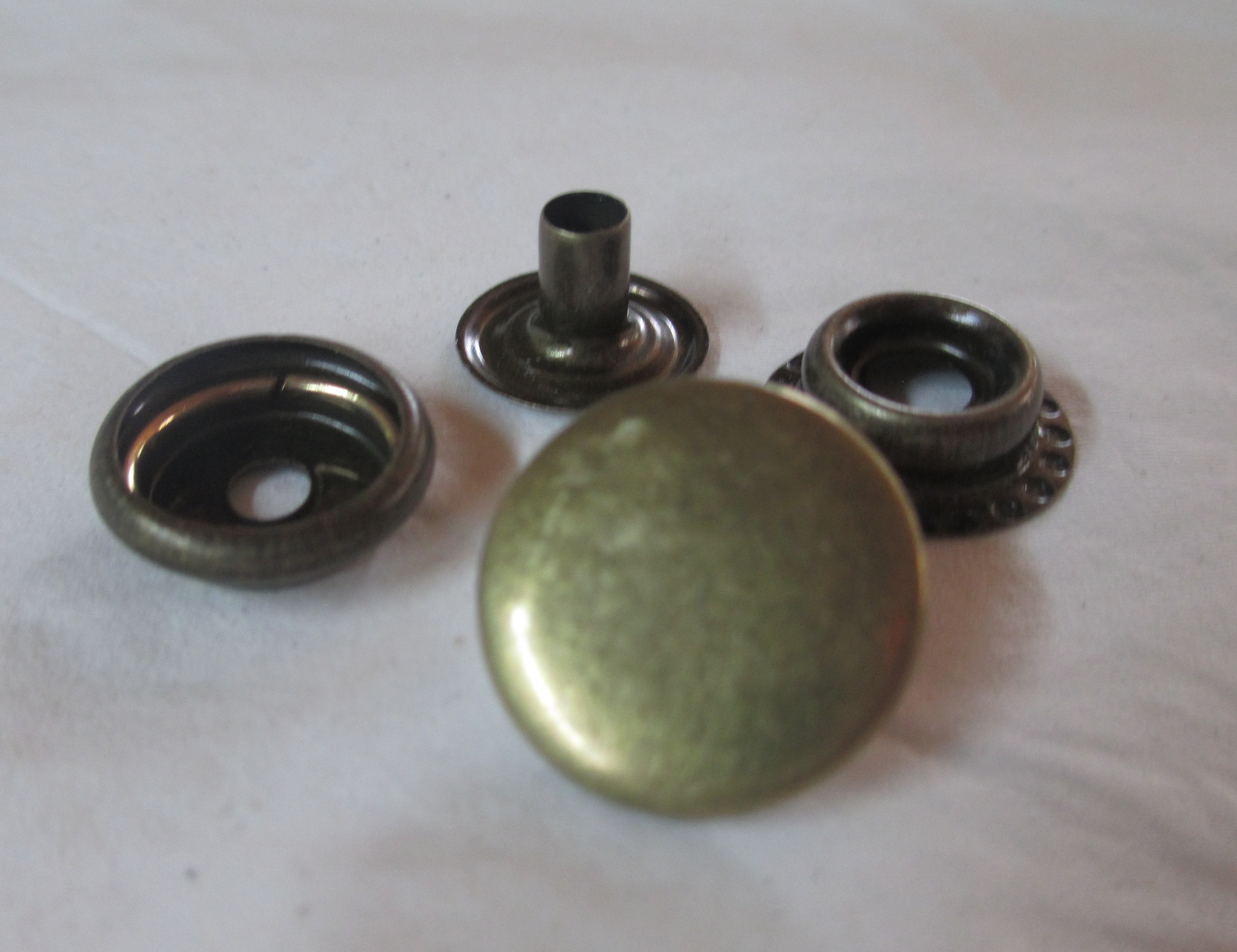 Light duty Snaps 9/16" cap 1/8" long post.
