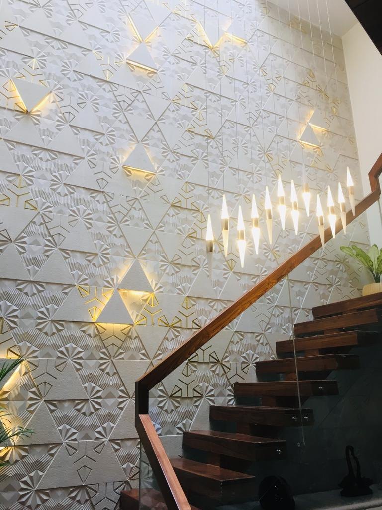 Modern Staircase with Geometric Wall and Pendant Lights Stone Wall Panel