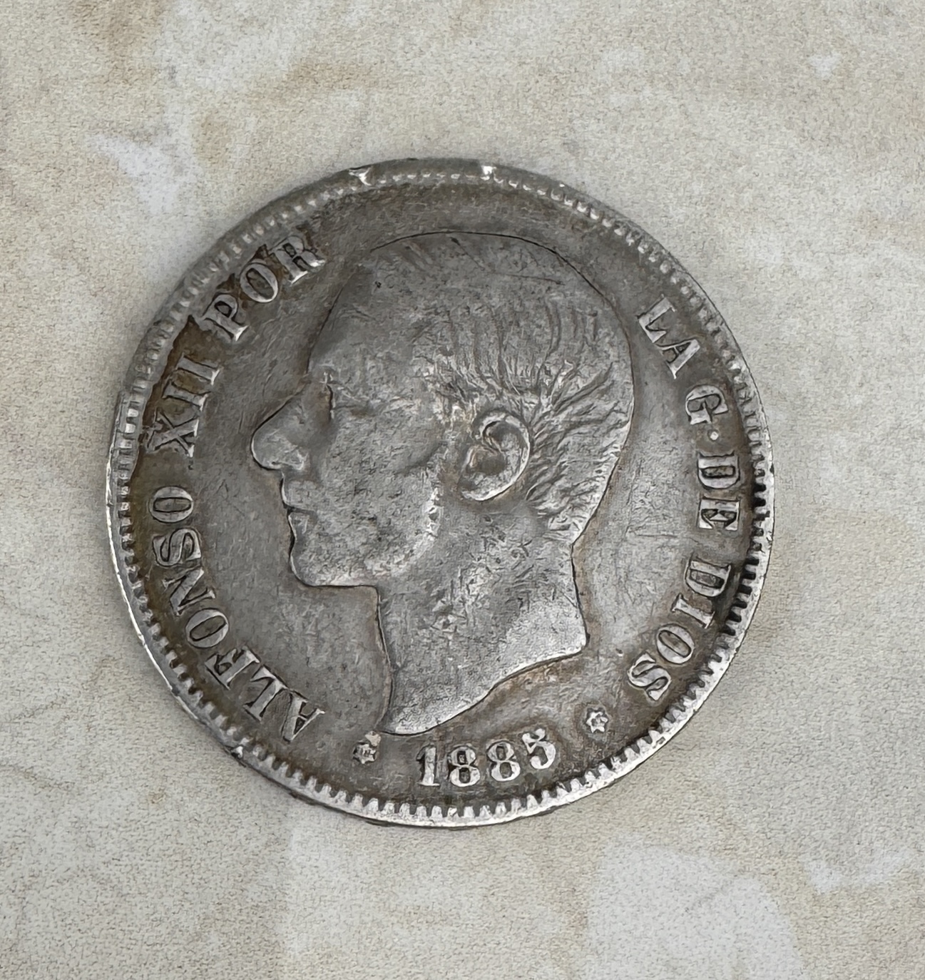 Lote 65- ALFONSO XII- Moneda de plata de 5 pesetas 1885 50/60 eur.