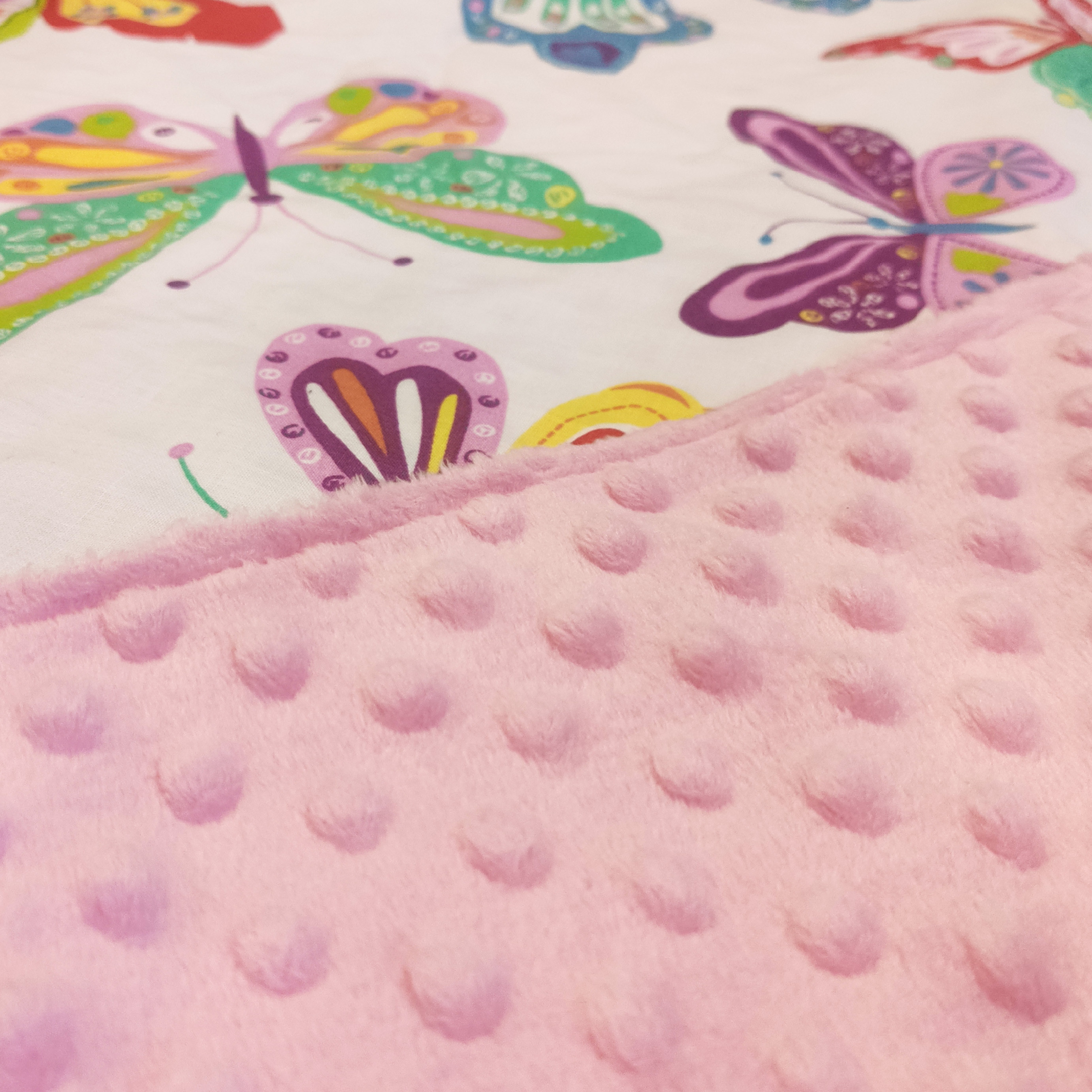 “Tauriņi” pleds un spilvens