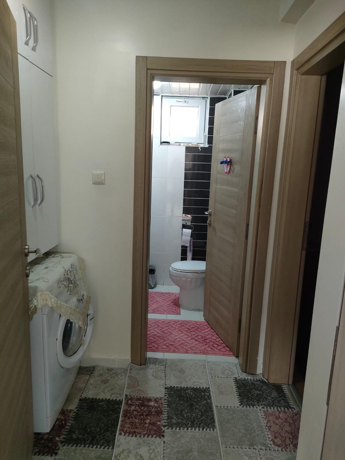 MAHMUDİYE MAHALLESİNDE  3+1    145M2  ZEMİN KAT YÜKSEK GİRİŞ  CAM BALKONLU