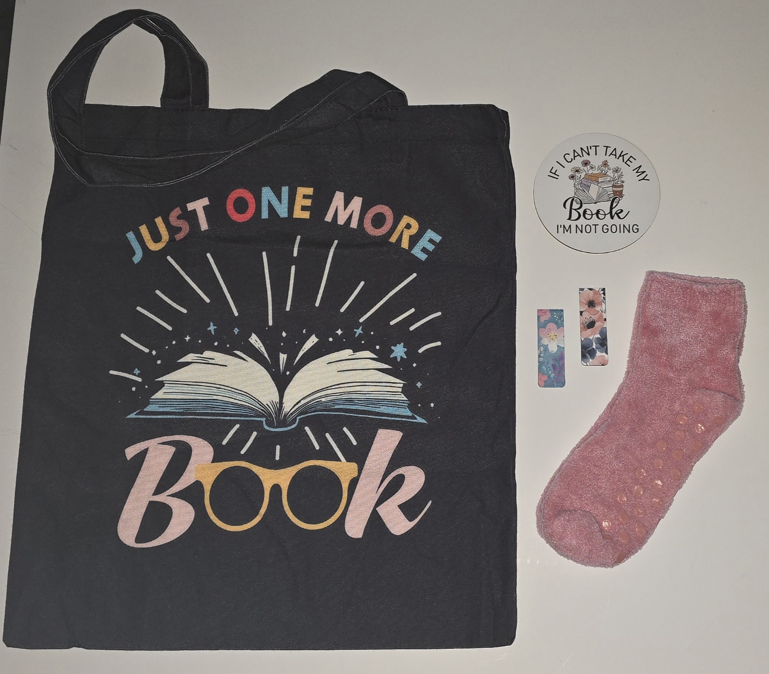 A fun book bag with coaster, socks and a mystery gift