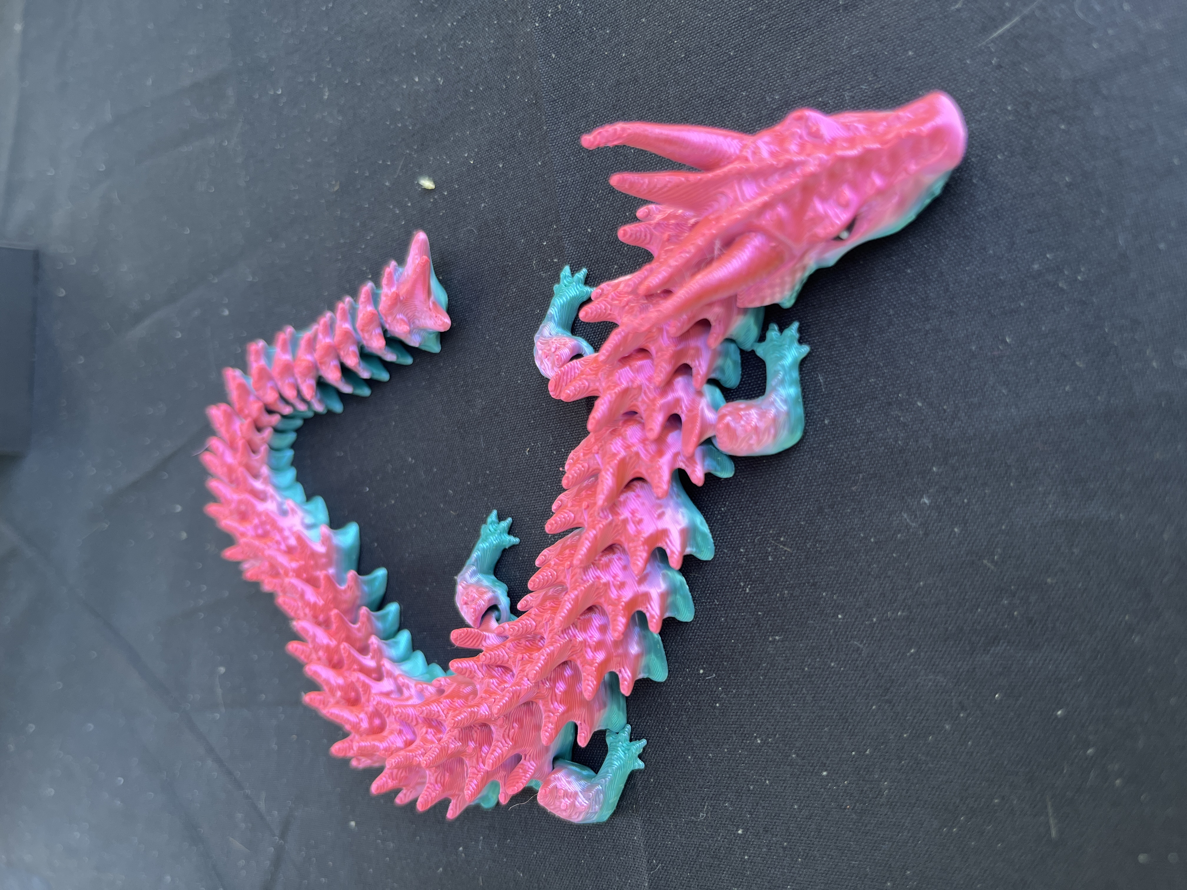 Dragon articulé rose et turquoise