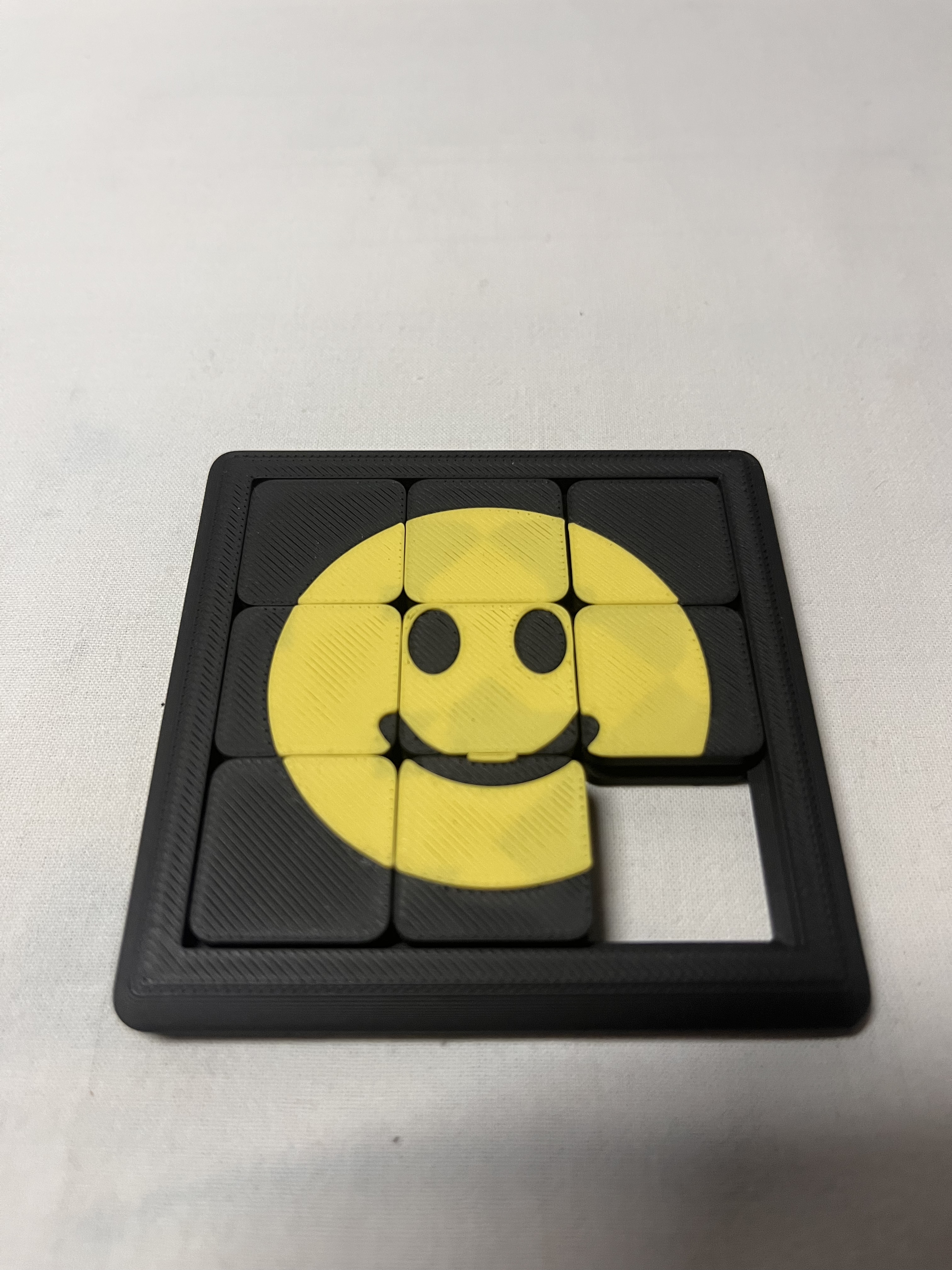 Puzzle coulissant smiley