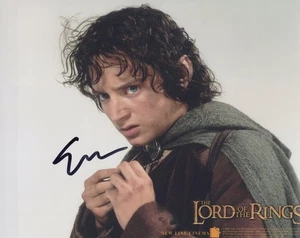 ELIJAH WOOD in THE LORD OF THE RINGS as Frodo Baggins.COA.In Pers.10"x8"