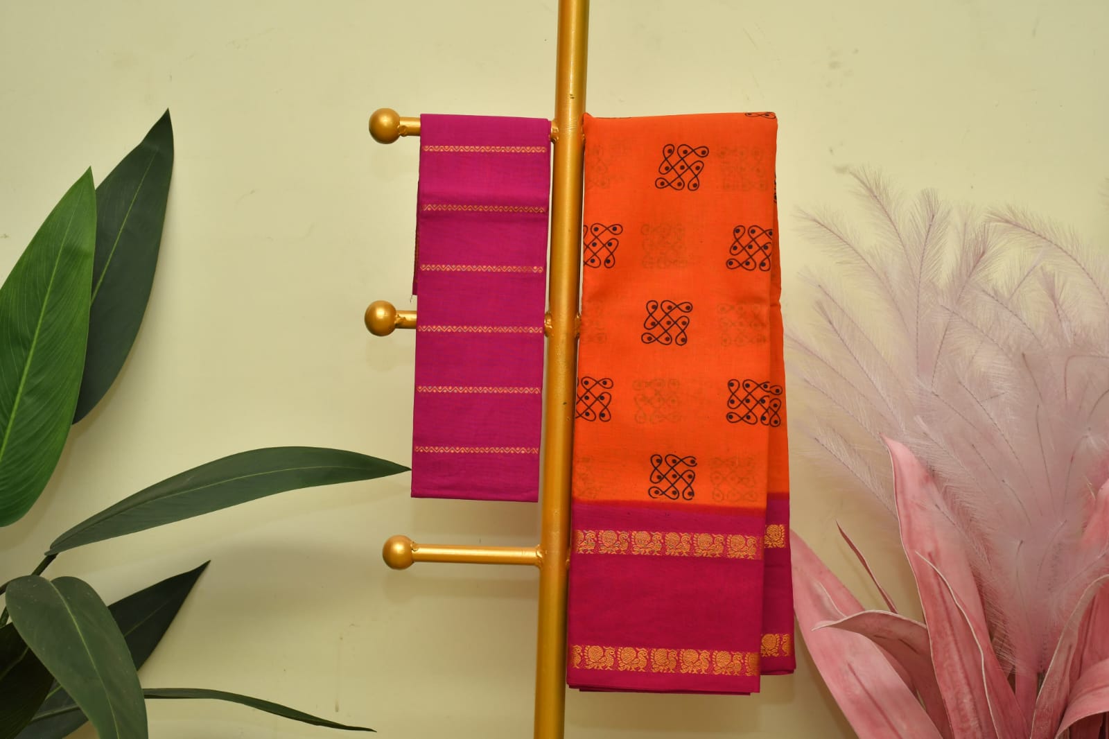 Orange Sungudi Saree with Pink Border