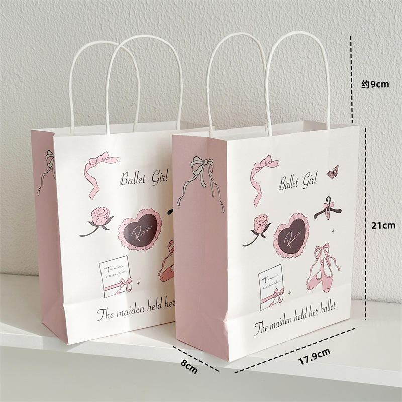 Chic pink printed paper gift bag with handle