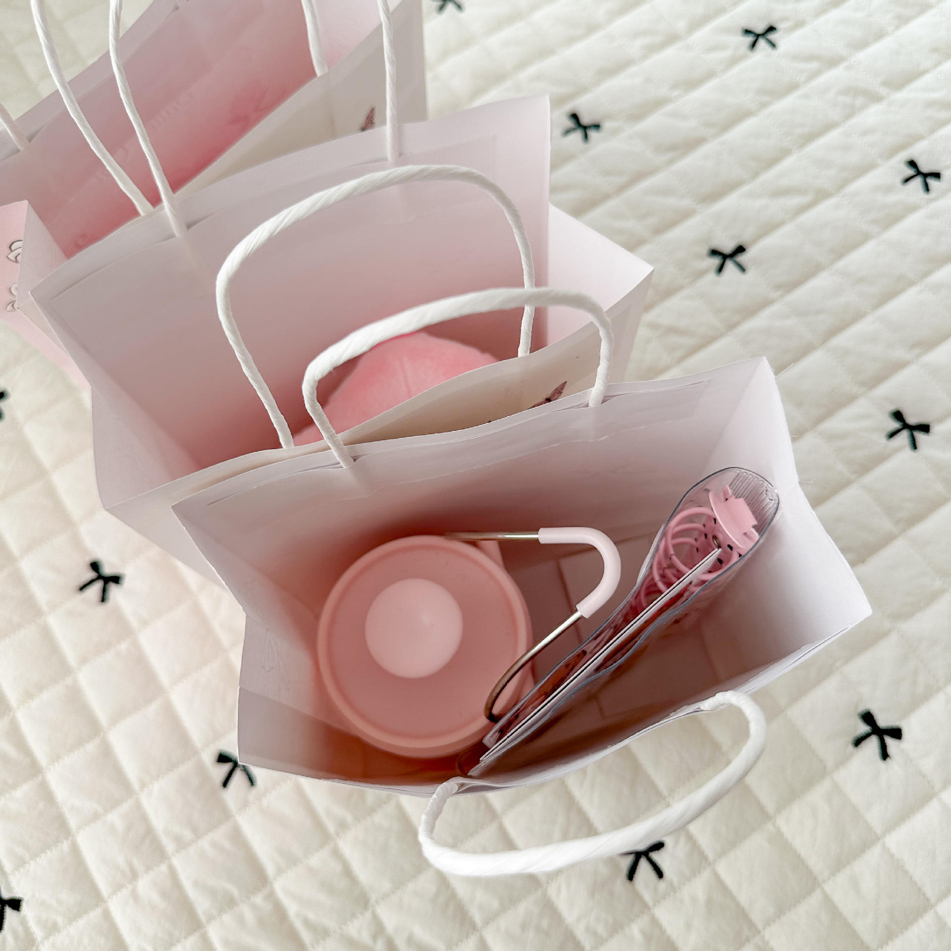 Chic pink printed paper gift bag with handle