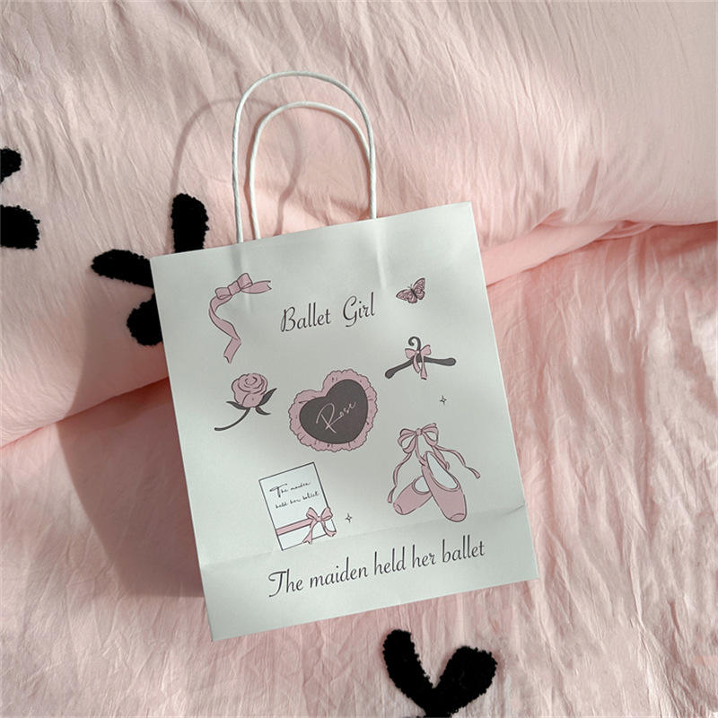 Chic pink printed paper gift bag with handle