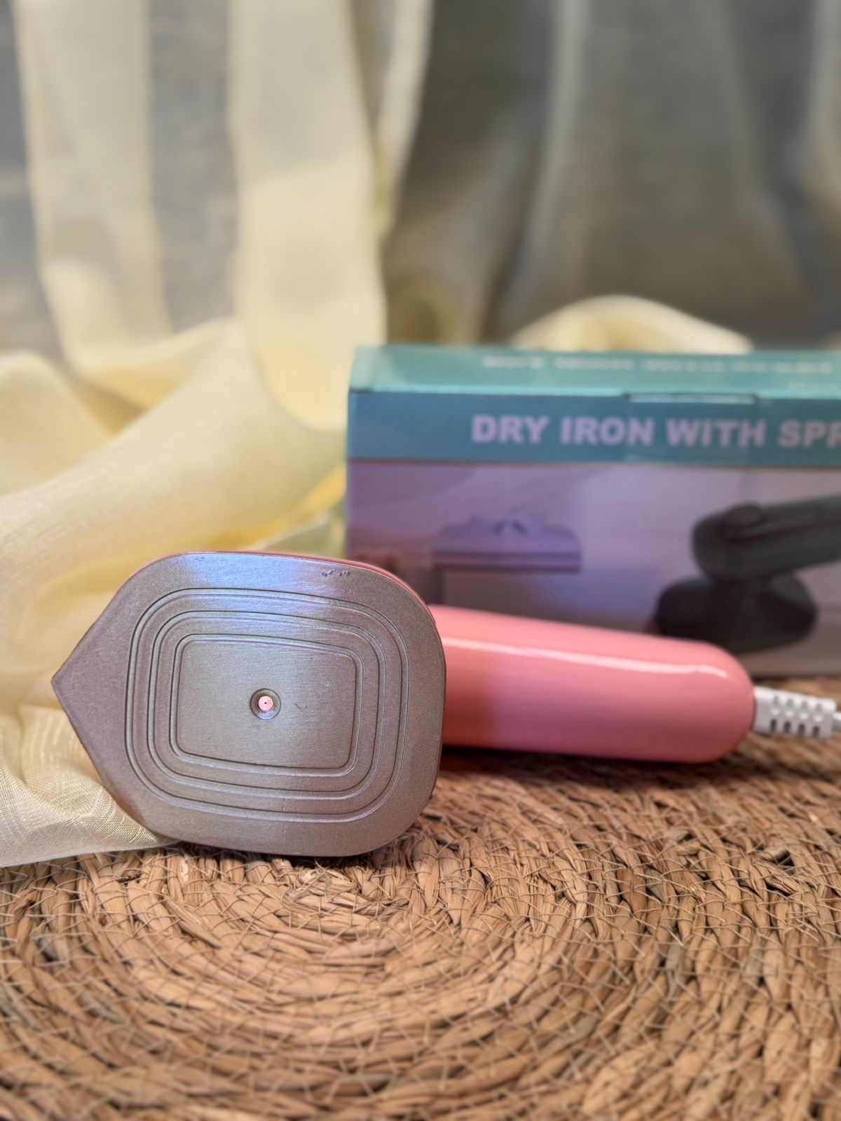 Plancha de mano con rociador