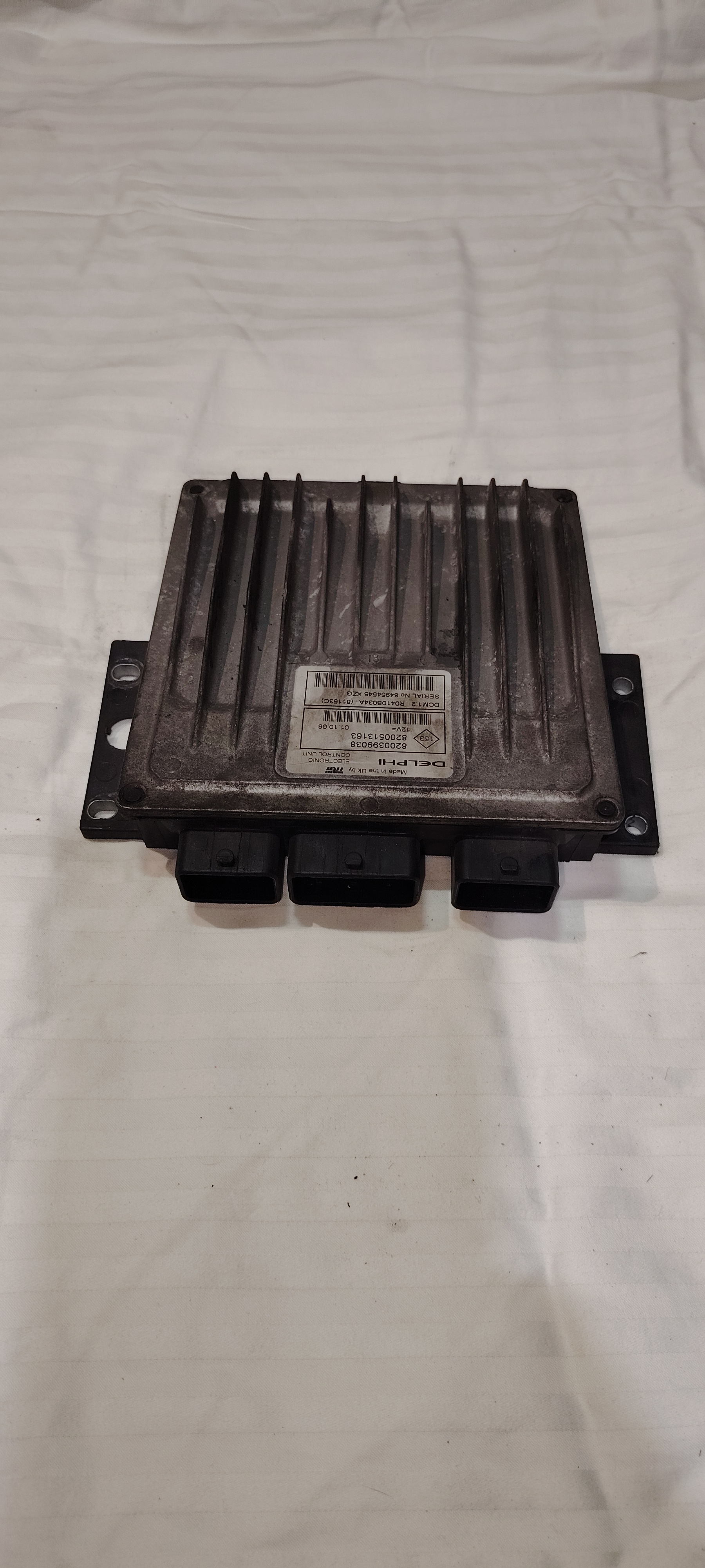 CALCULATEUR MOTEUR DCM1.2 R0410B034A 8200399038 8200513163 RENAULT