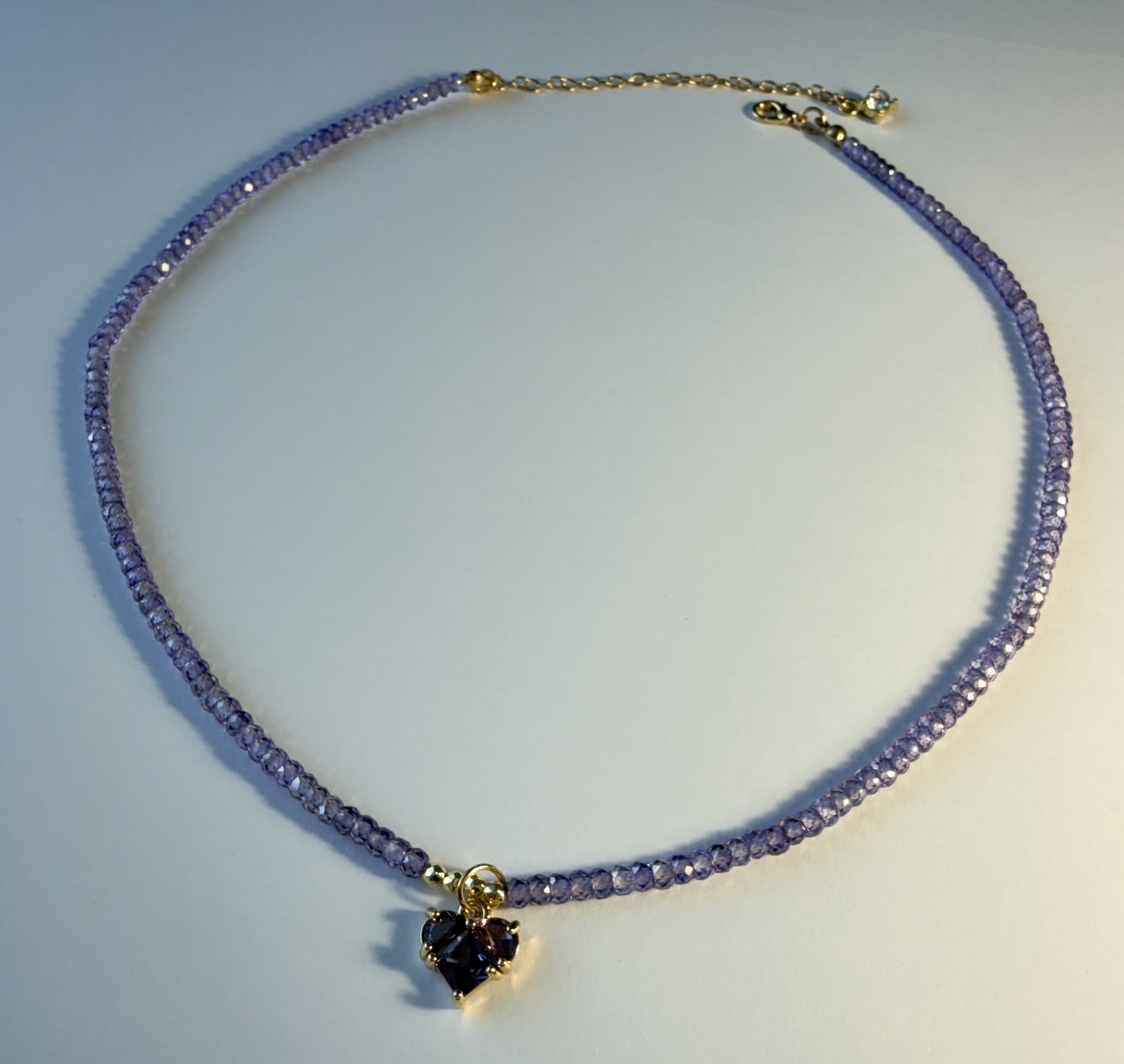Violetinis cirkonio vėrinys