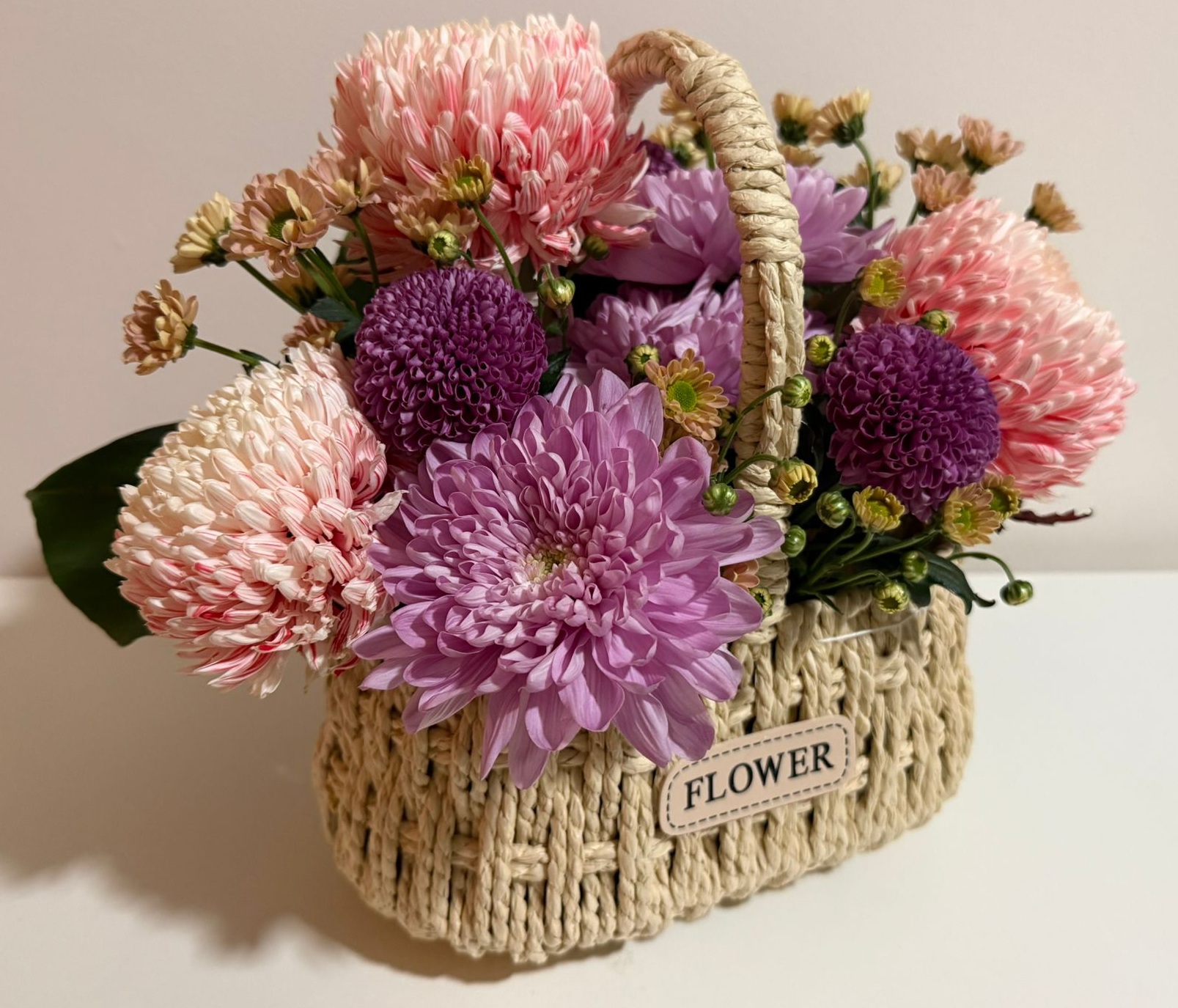 Pink and Purple Chrysanthemum Basket Arrangement with Manuka Honey and Baked Nuts