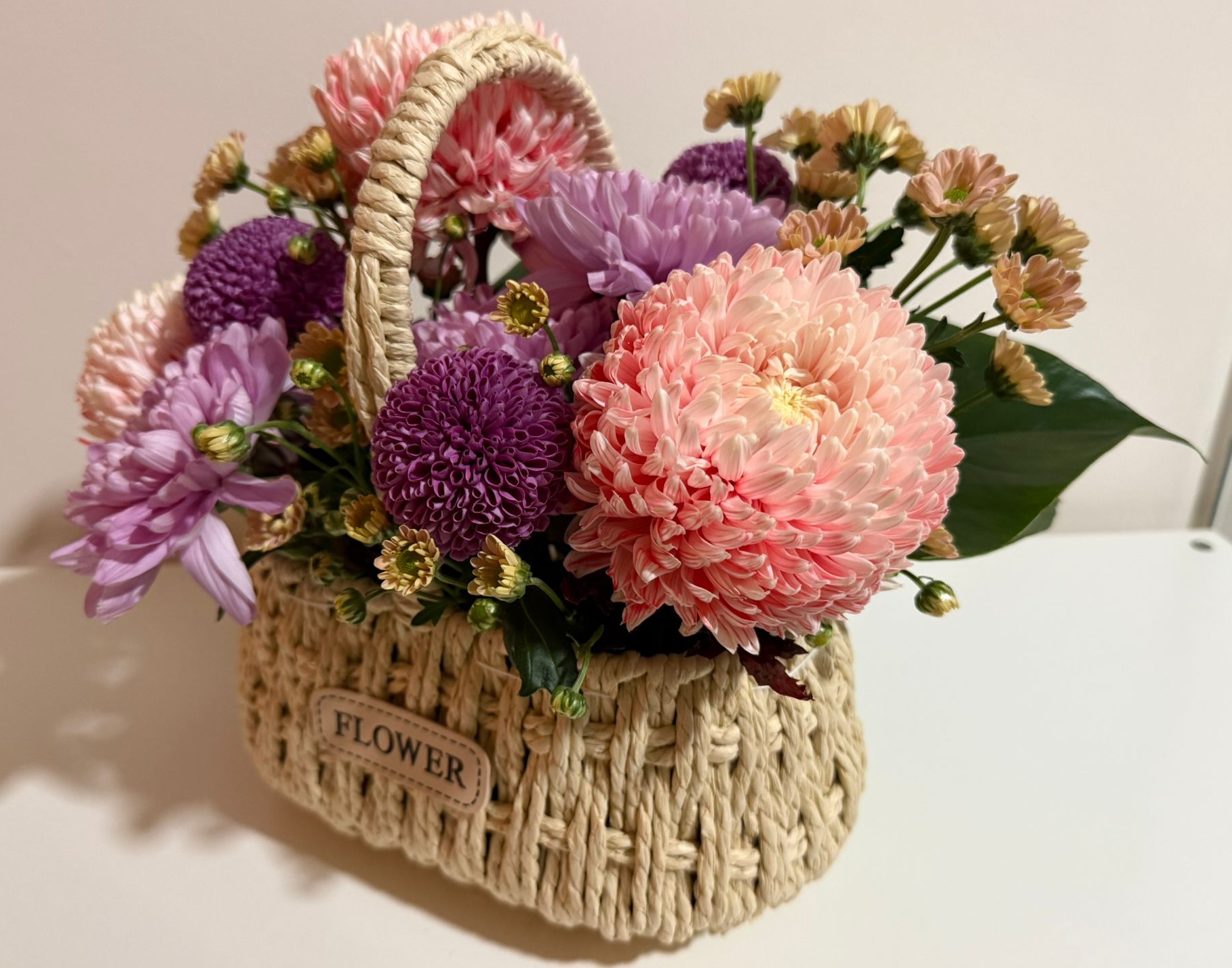 Pink and Purple Chrysanthemum Basket Arrangement with Manuka Honey and Baked Nuts