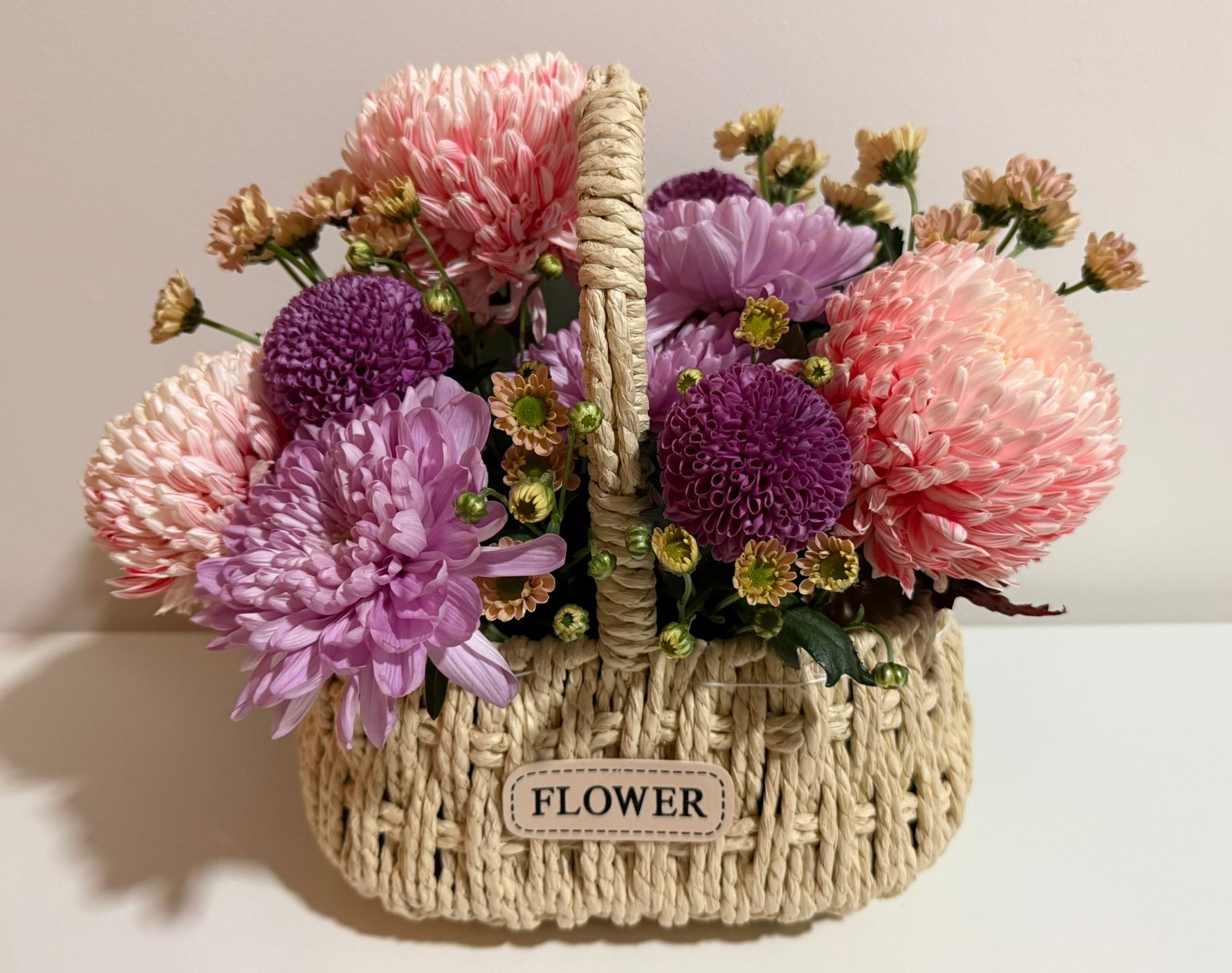 Pink and Purple Chrysanthemum Basket Arrangement with Manuka Honey and Baked Nuts