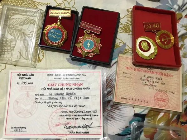 Original Vietcong 1975-1995 10 Medals Original Set of 10 medals and 4 Vietcong document 1975-1995 