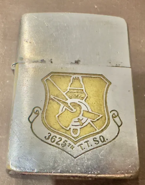 Vietnam War - US Military Vietnam 3625th TTSQ & Weapon Controller School Tyndall AFB Florida Zippo Lighter (Unclear Point at the bottom)
