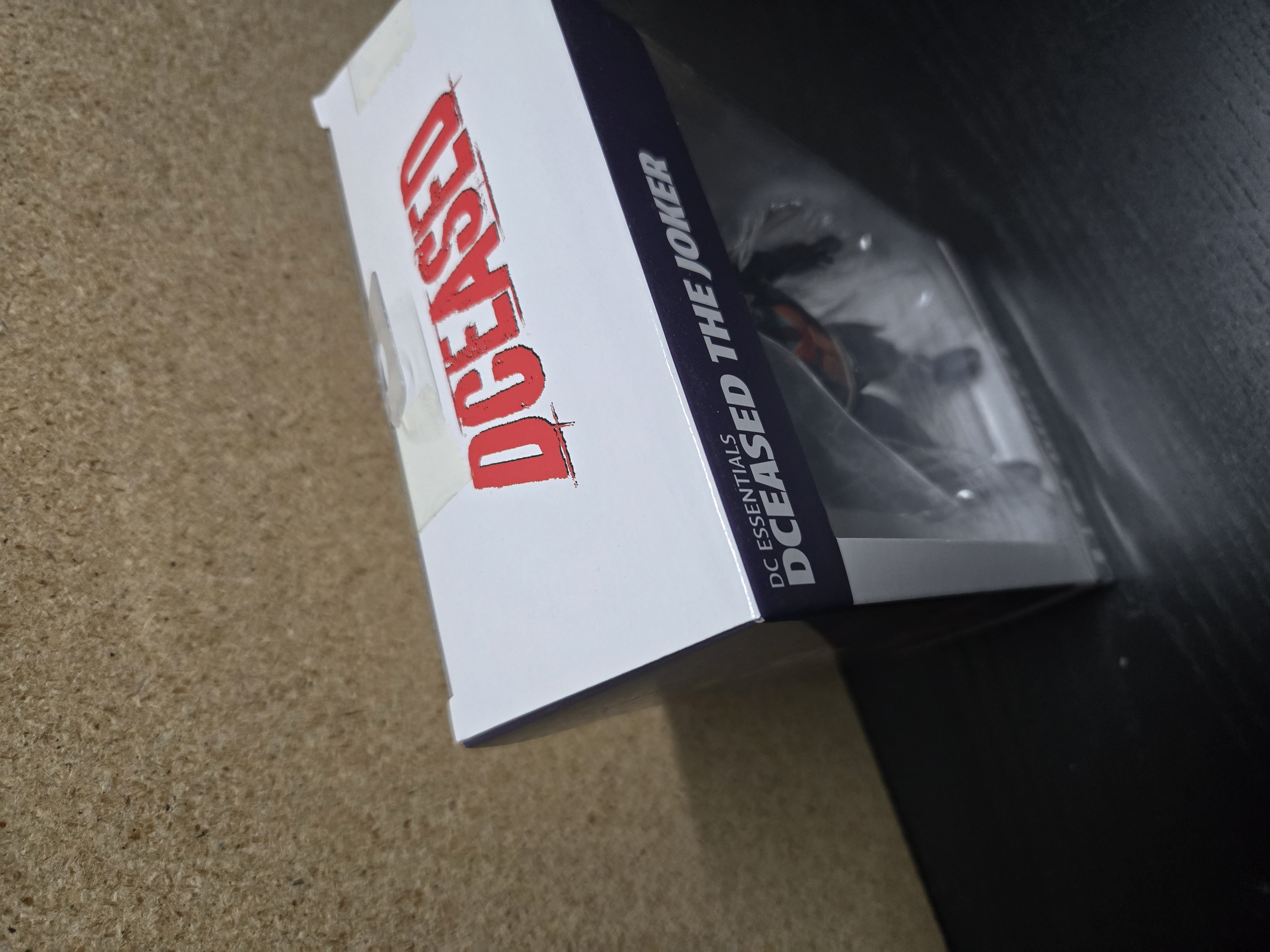 DC Essentials Dceased The Joker Action Figure