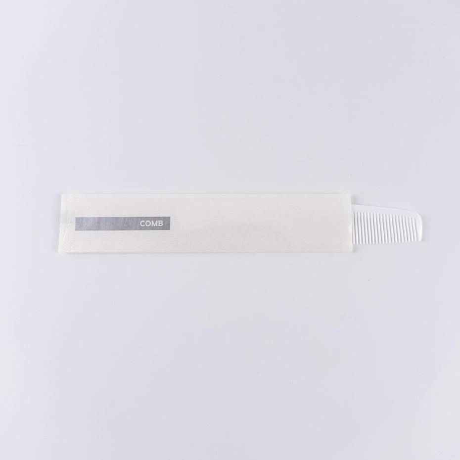 Plastic comb 7" in white pouch 