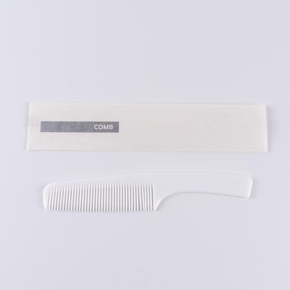 Plastic comb 7" in white pouch 