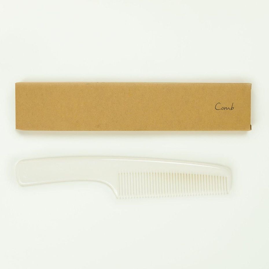 Plastic Comb in Brown box 