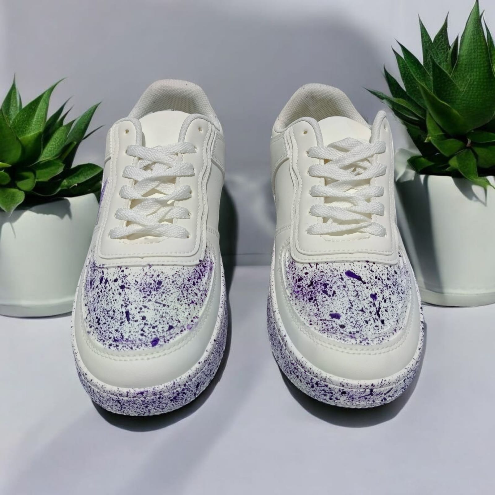 White Sneakers with Purple Splash