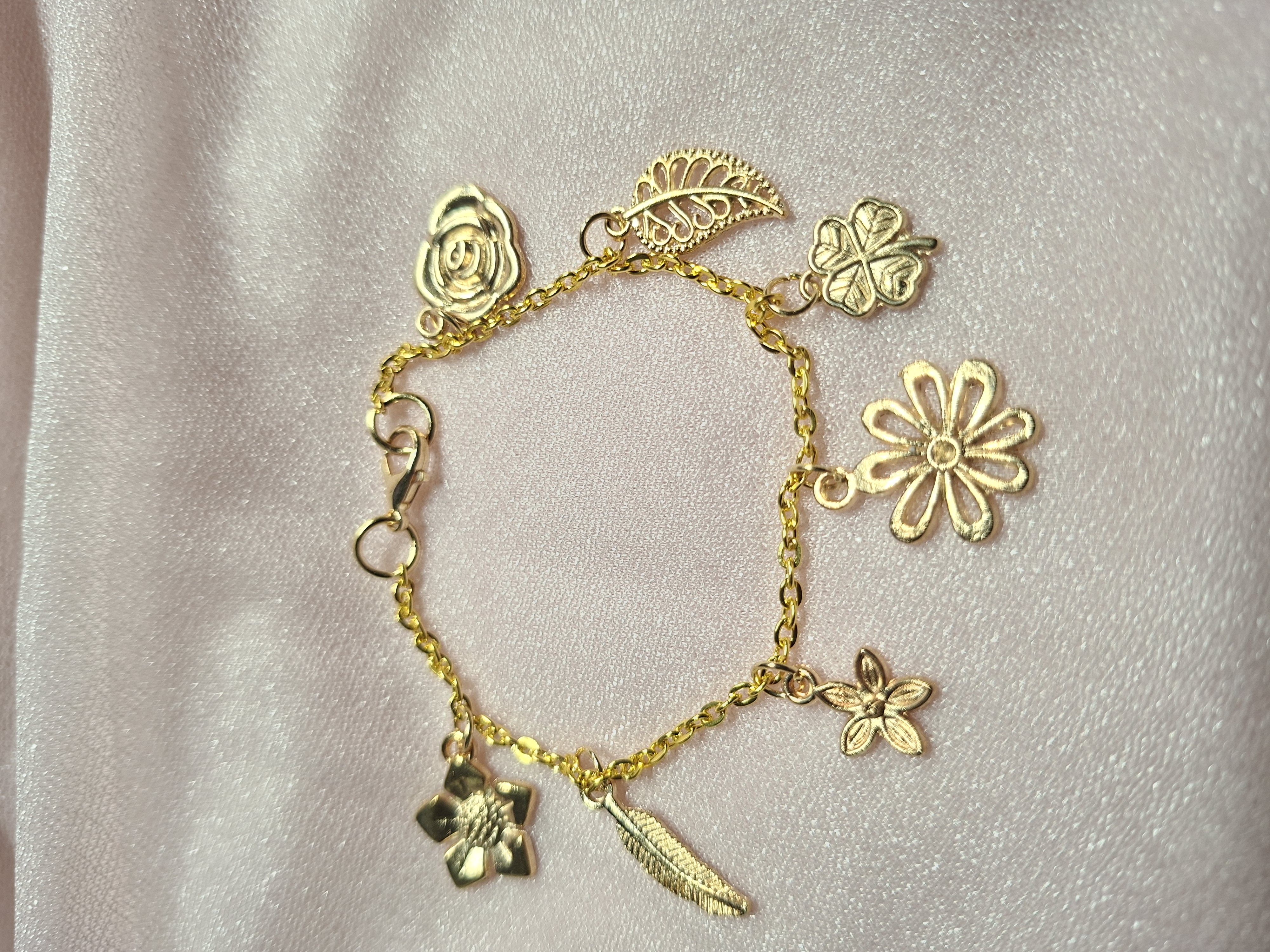 Bracelet 7 Breloques Or