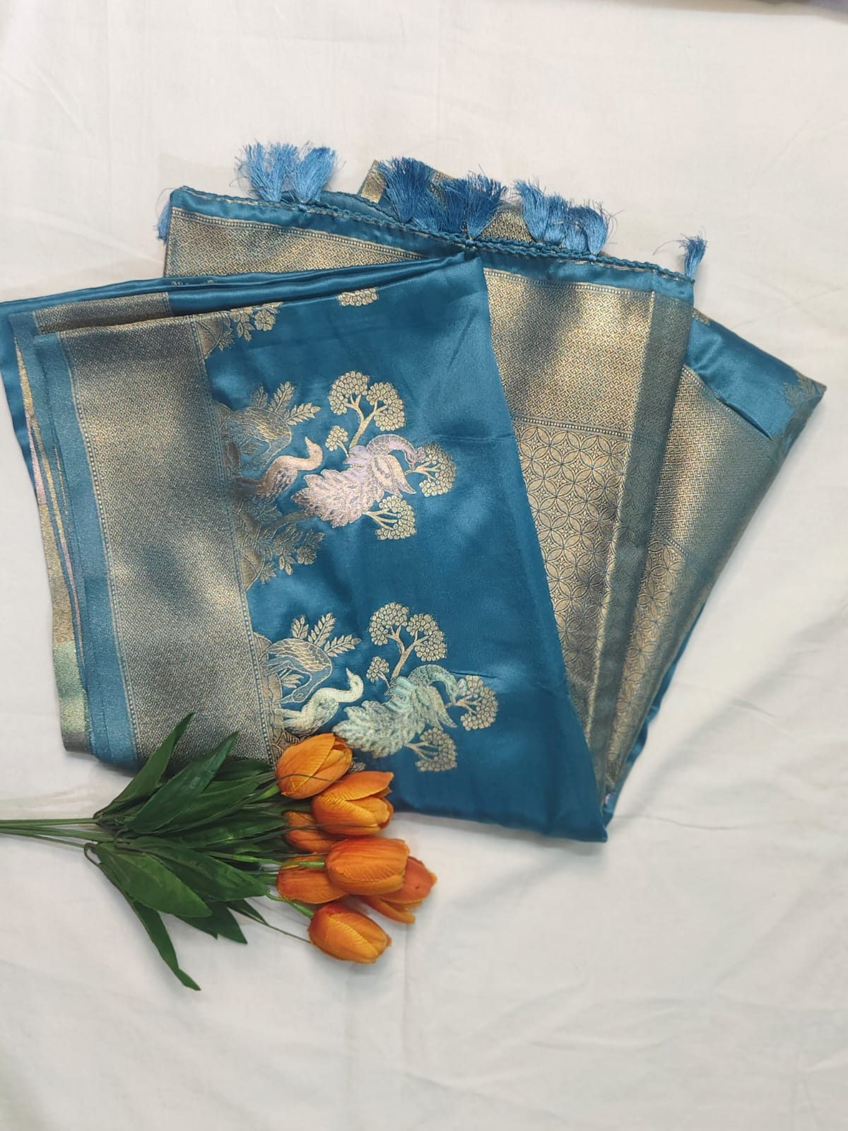 Elegant Sky Blue Pattu Fancy Saree with Golden Peacock Weaving