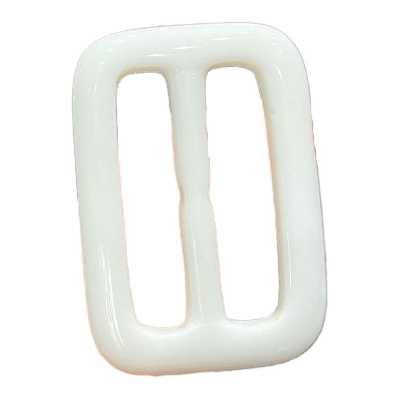 This white and black resin buckle is commonly used as an adjuster for backpack straps or belts.