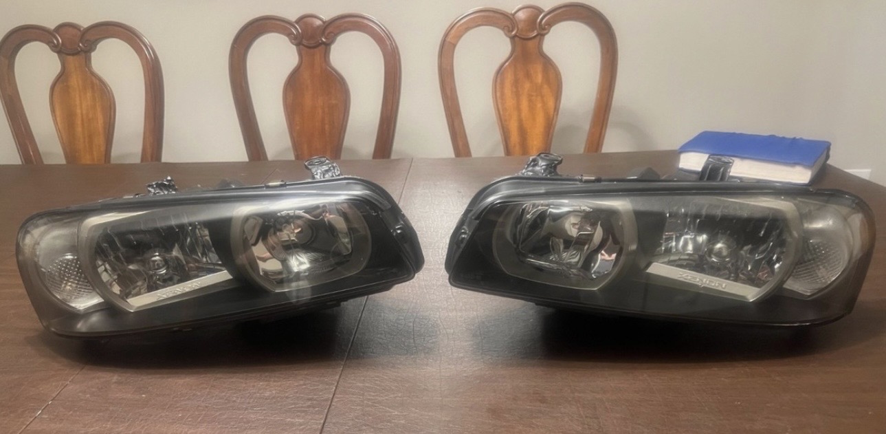 Genuine Nissan Skyline R34 GTR Series 2 Xenon Headlight Housing Set
