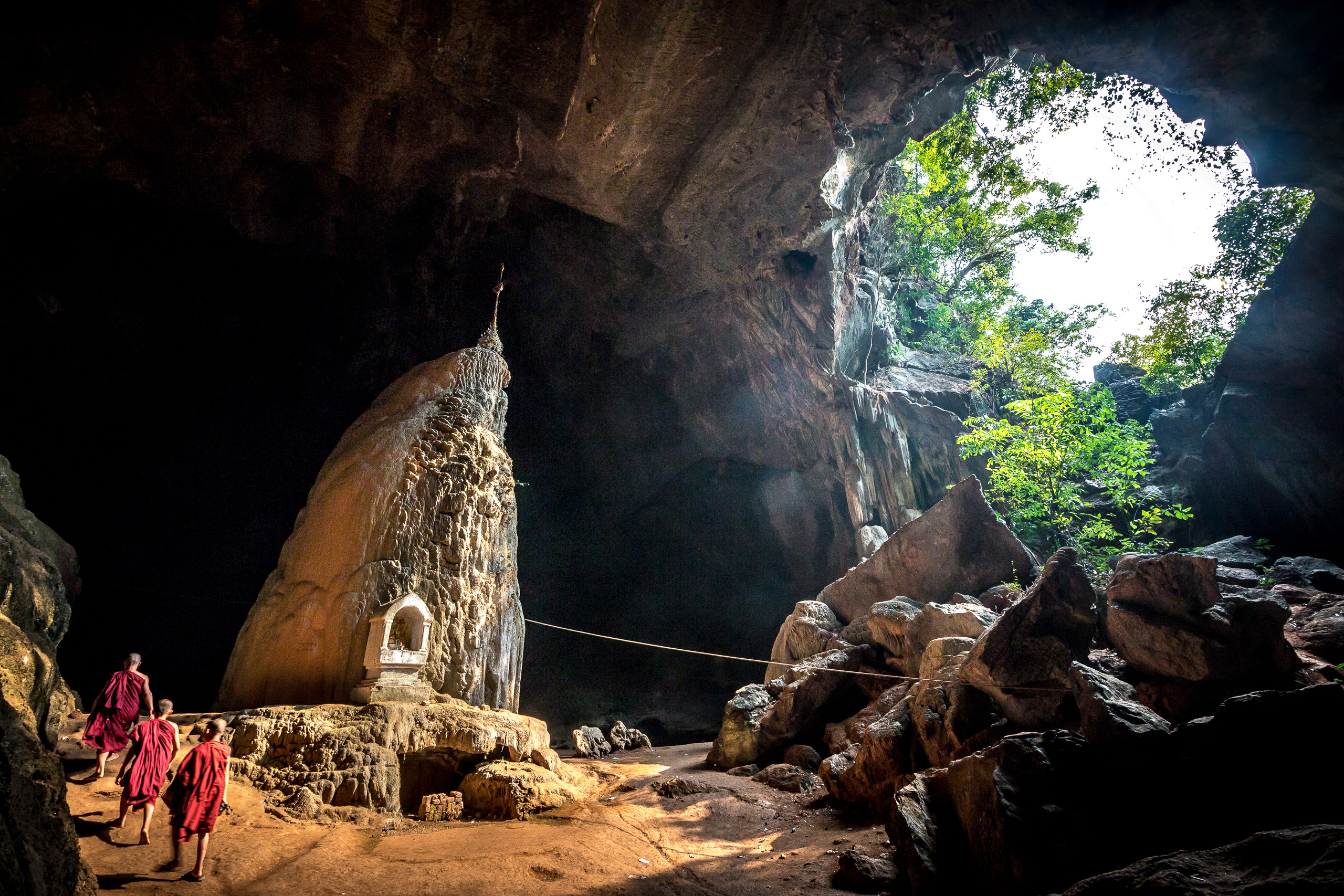 Buddhist Monks In Mystical Cave 