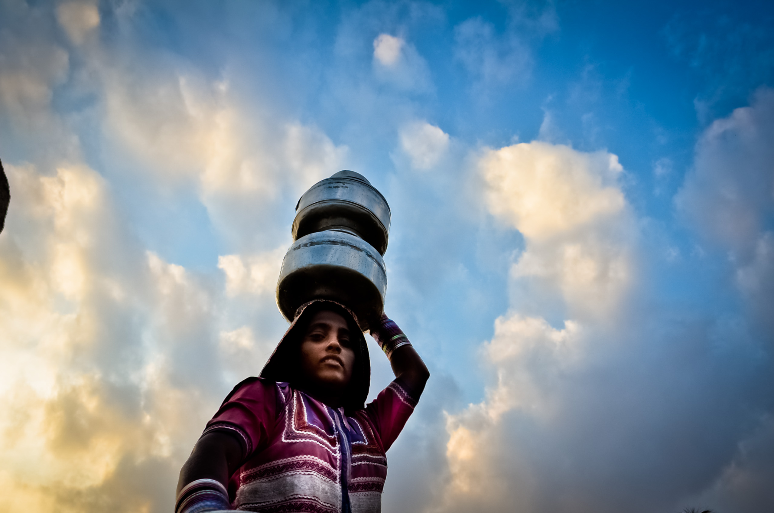 Carrying Water Pots From The Well Photo Print