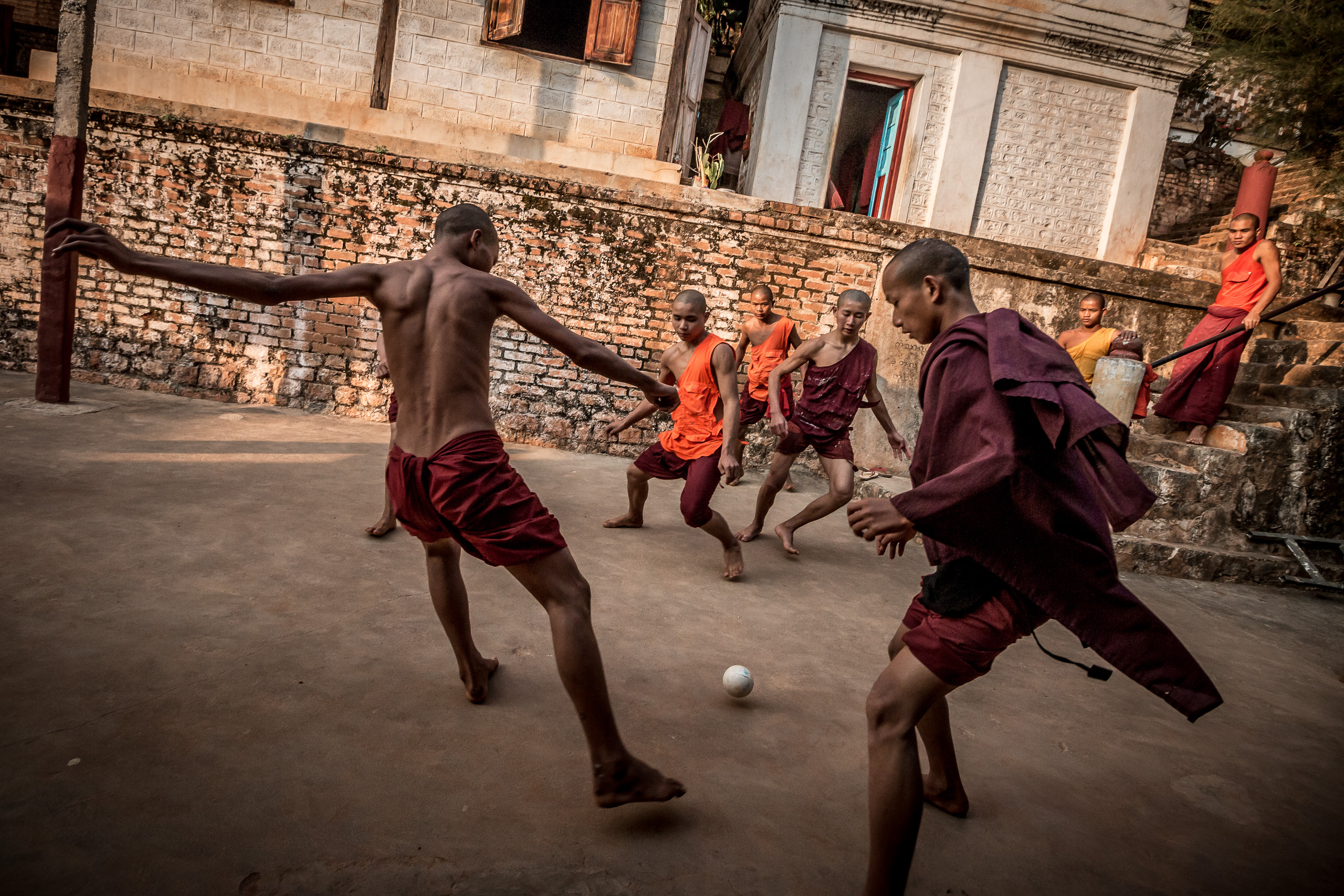 Monks Playing Soccer Art Print