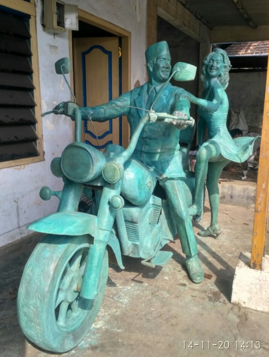 President of Indonesia 1st Soekarno with Marilyn Monroe riding a Harley Davidson.  Bronze cast