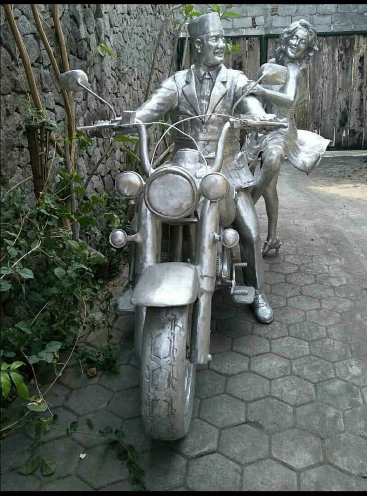 President of Indonesia 1st Soekarno with Marilyn Monroe riding a Harley Davidson. Aluminium cast