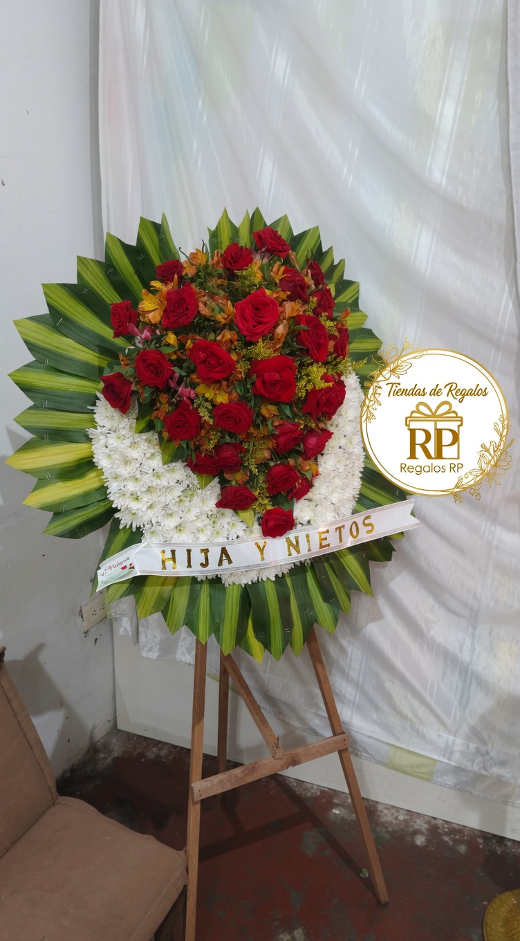 Corona fúnebre de rosas rojas