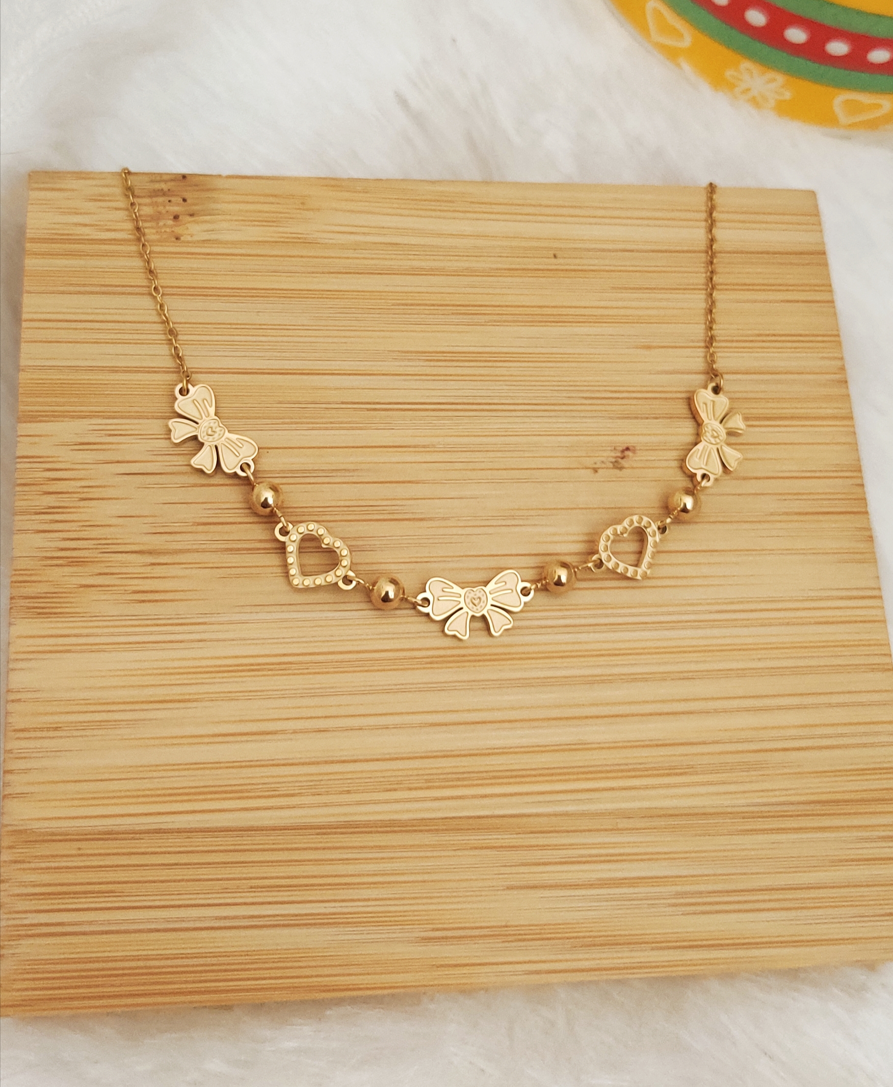 Gold Bow & Heart Motif Necklace