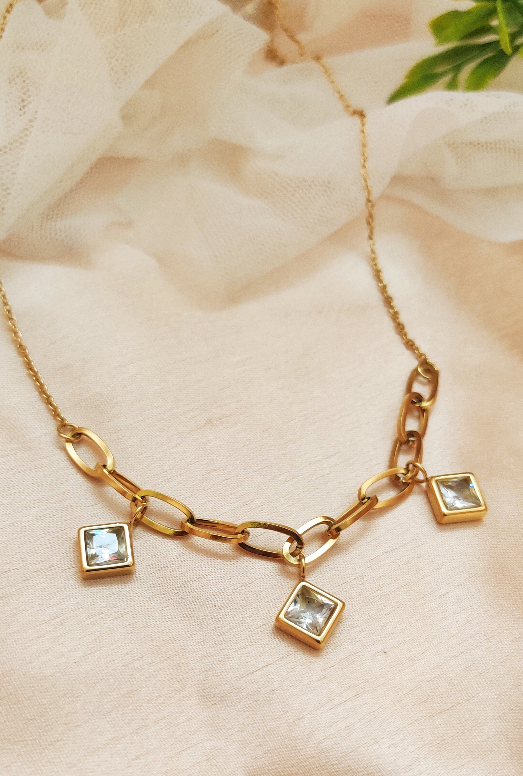 Gold Chain Necklace with White Gemstone Charms