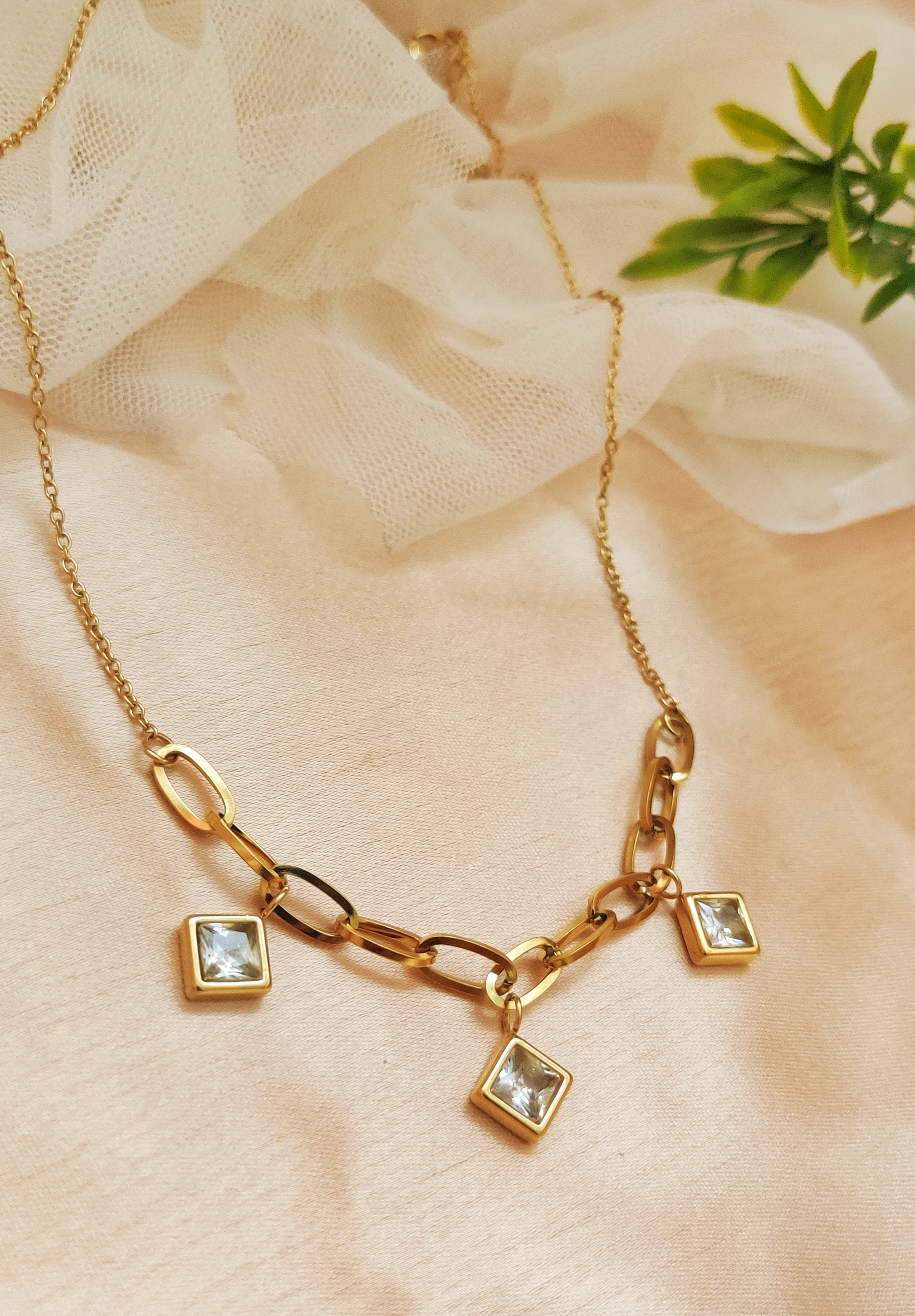 Gold Chain Necklace with White Gemstone Charms