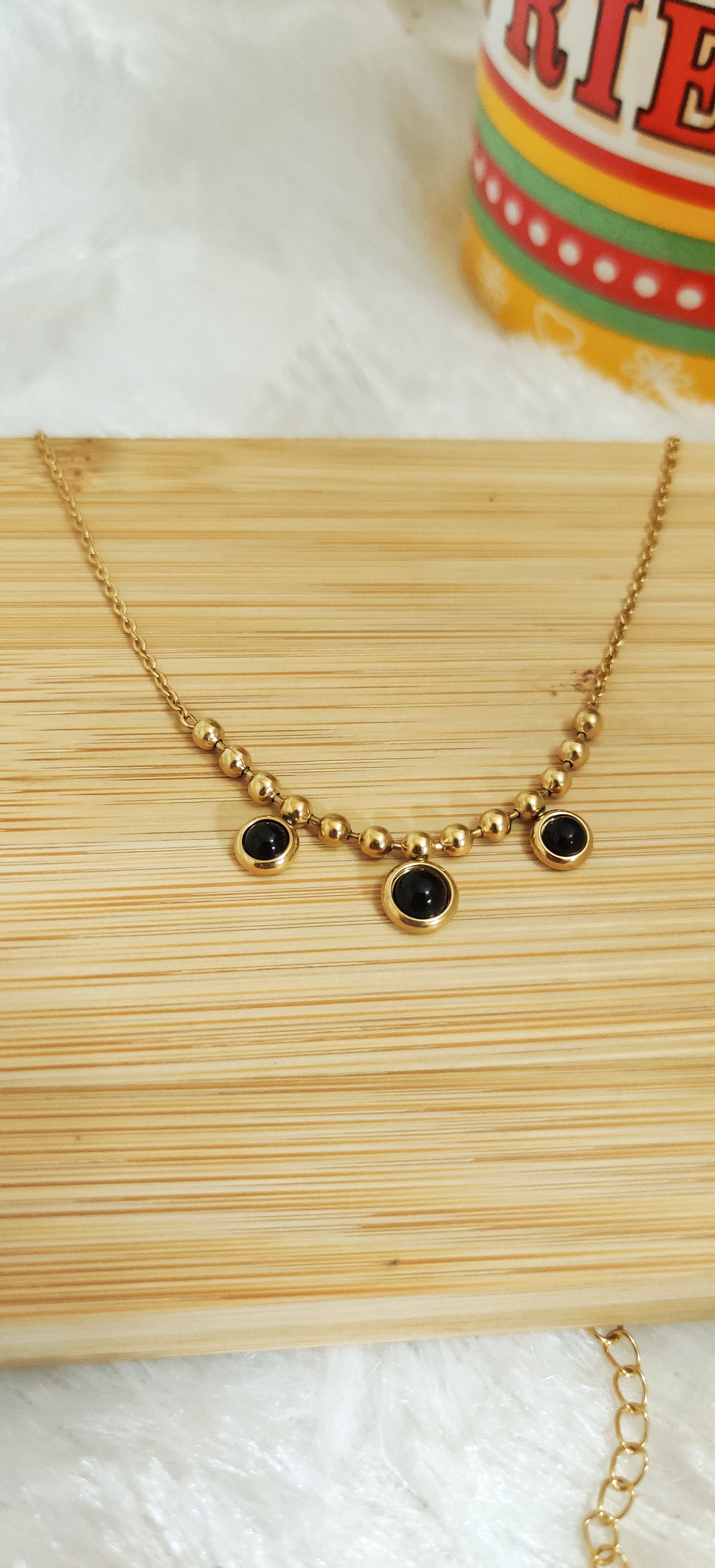 Gold Bead Pendant Necklace with black accents