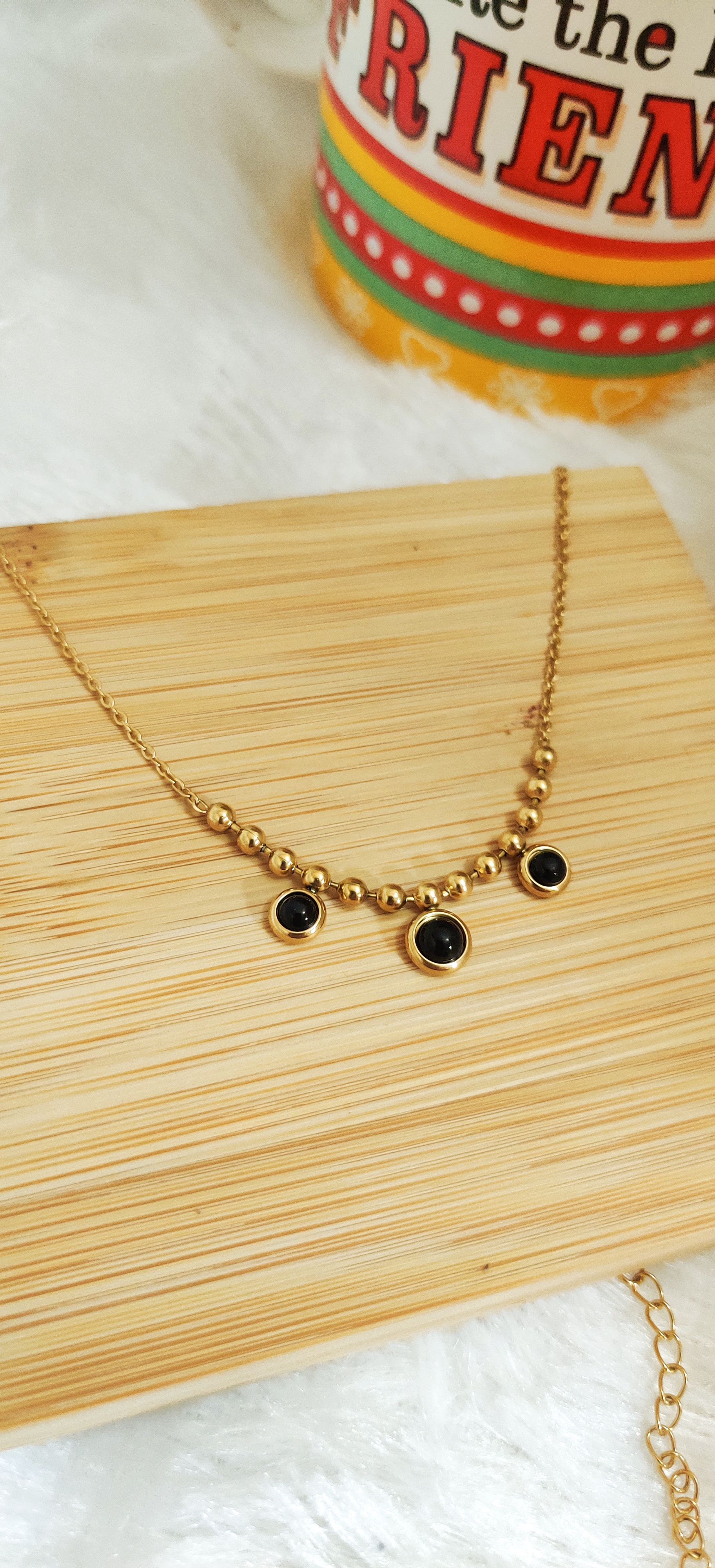 Gold Bead Pendant Necklace with black accents