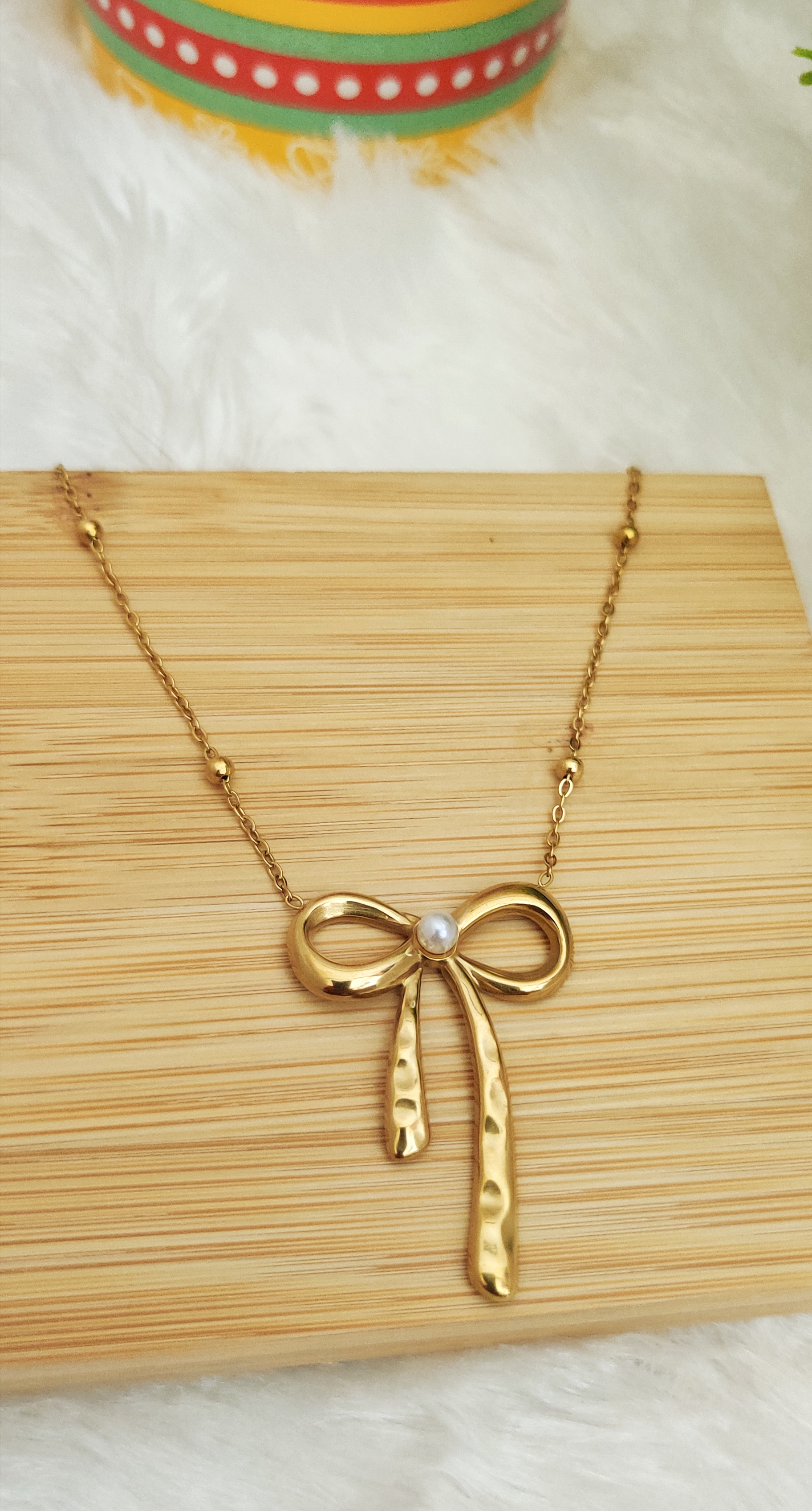Golden Bow Pendant Necklace