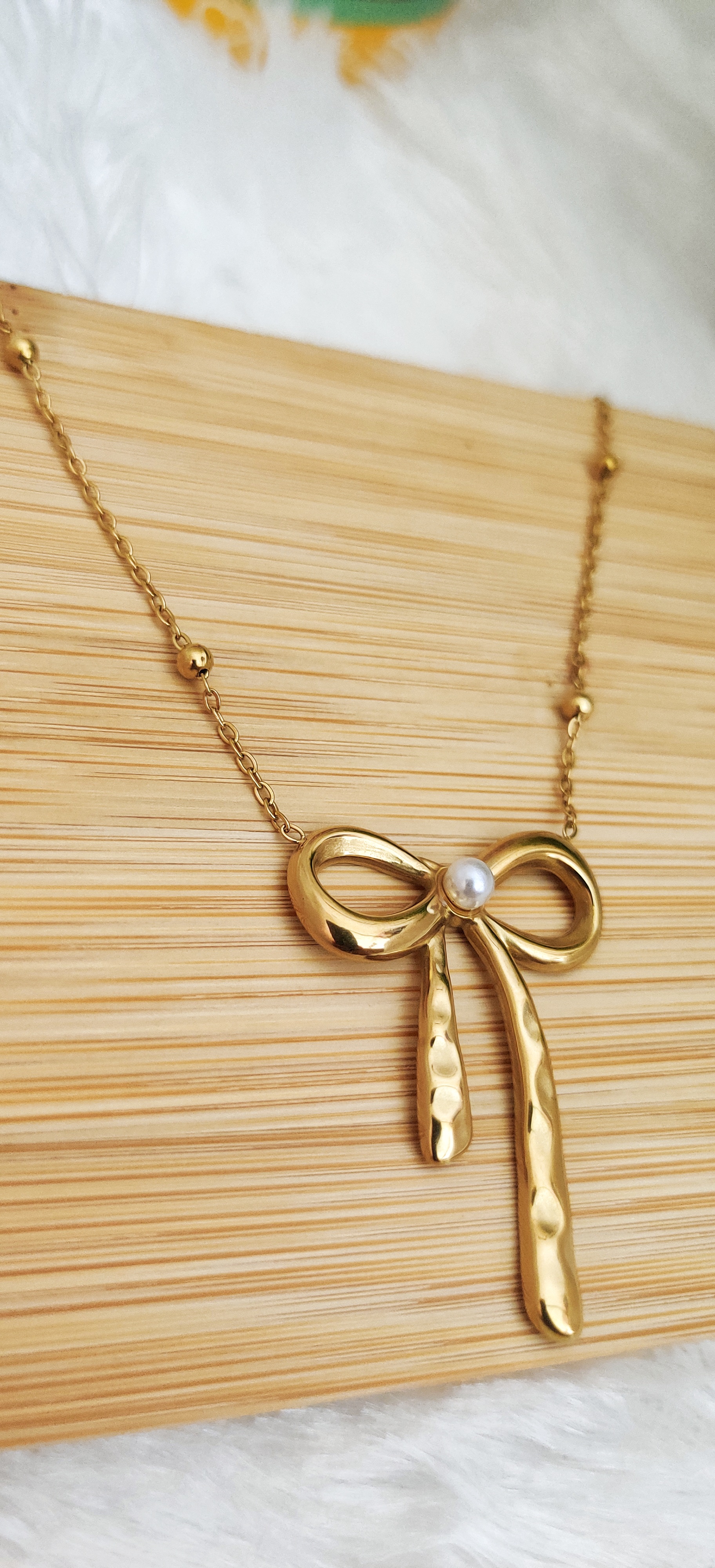 Golden Bow Pendant Necklace